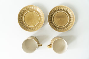 Set of two Jens H. Quistgaard Relief coffee cups and saucers.