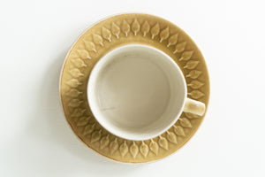 Set of two Jens H. Quistgaard Relief coffee cups and saucers.